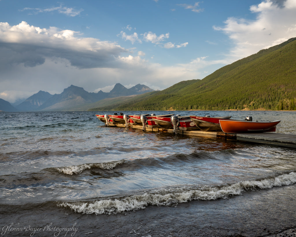boats on dock over lake