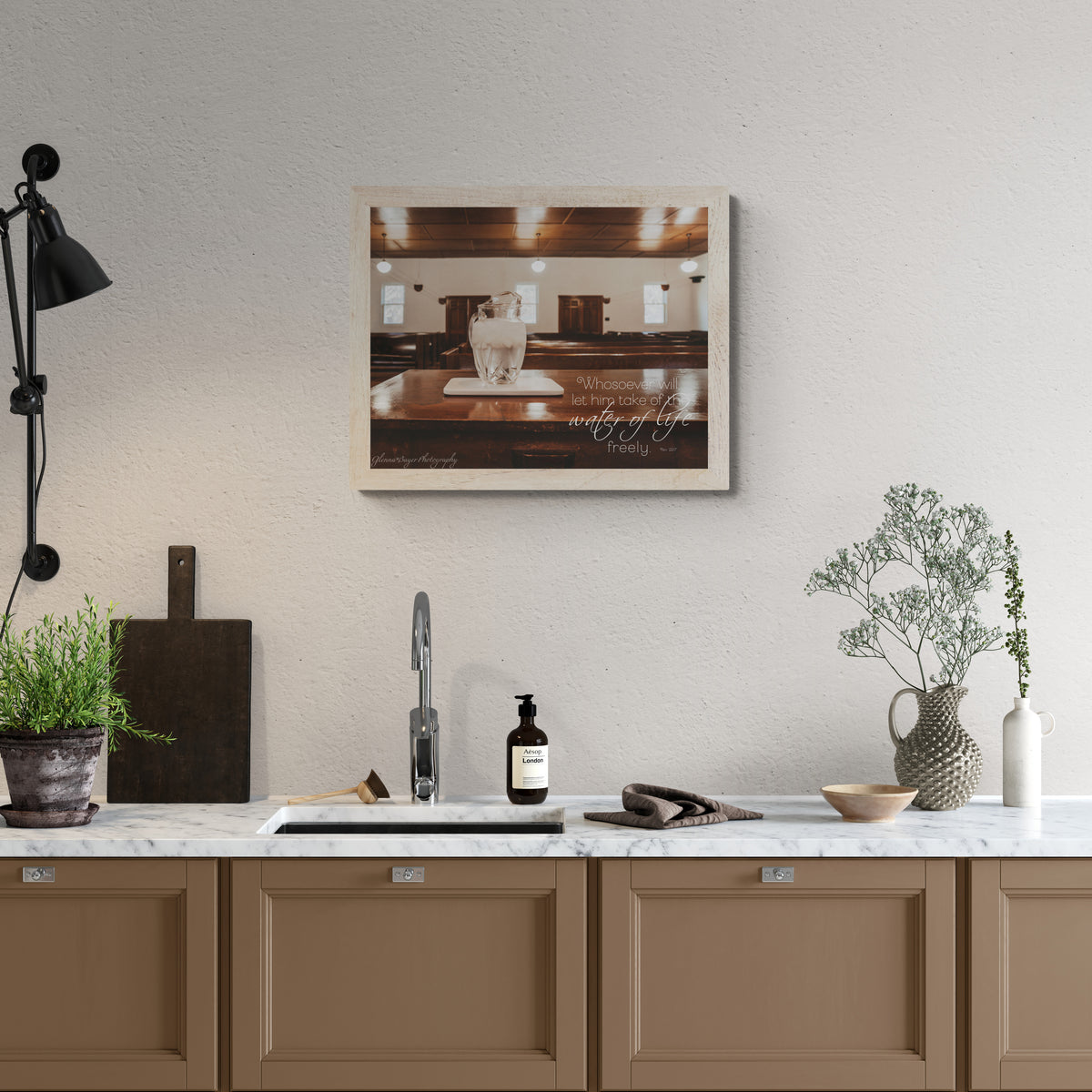 print displayed on wall in kitchen