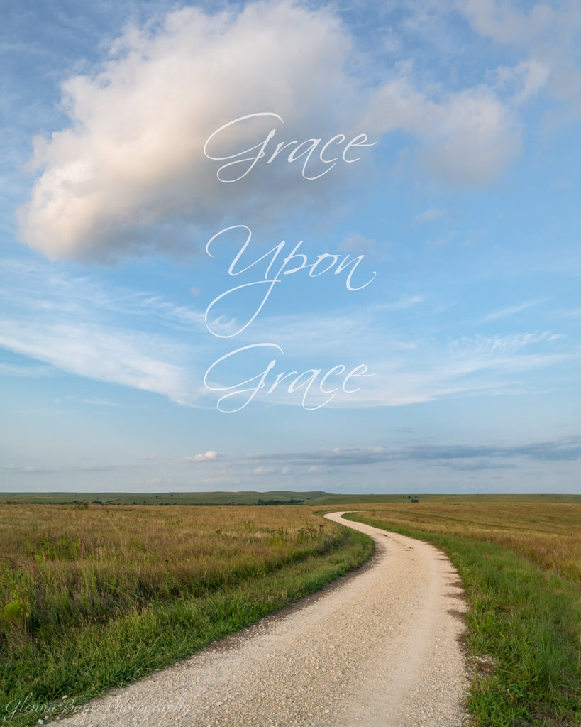 Gravel road through the Kansas Flint Hills with words "Grace upon Grace"