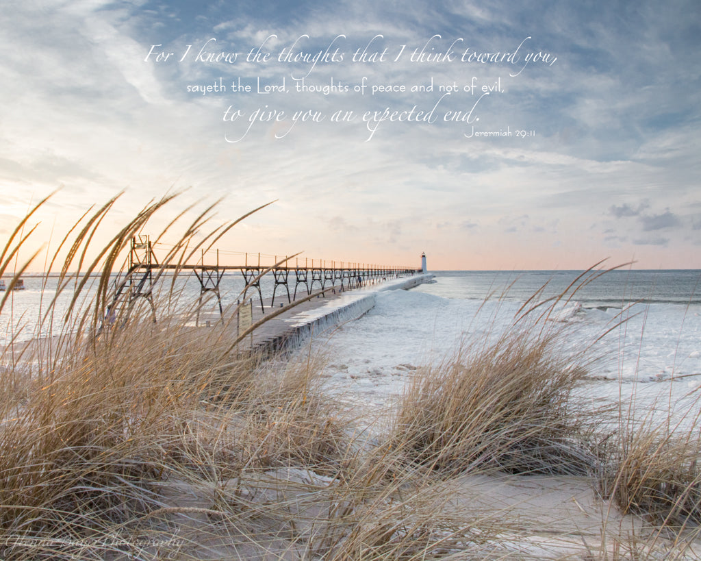 Manistee Lighthouse and beach at Sunrise with bible verse