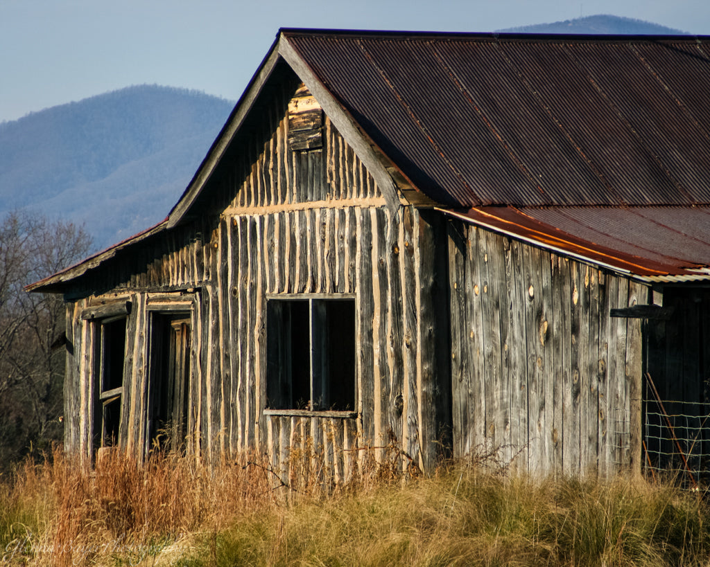 Old rustic wood barn during fall in West Virginia