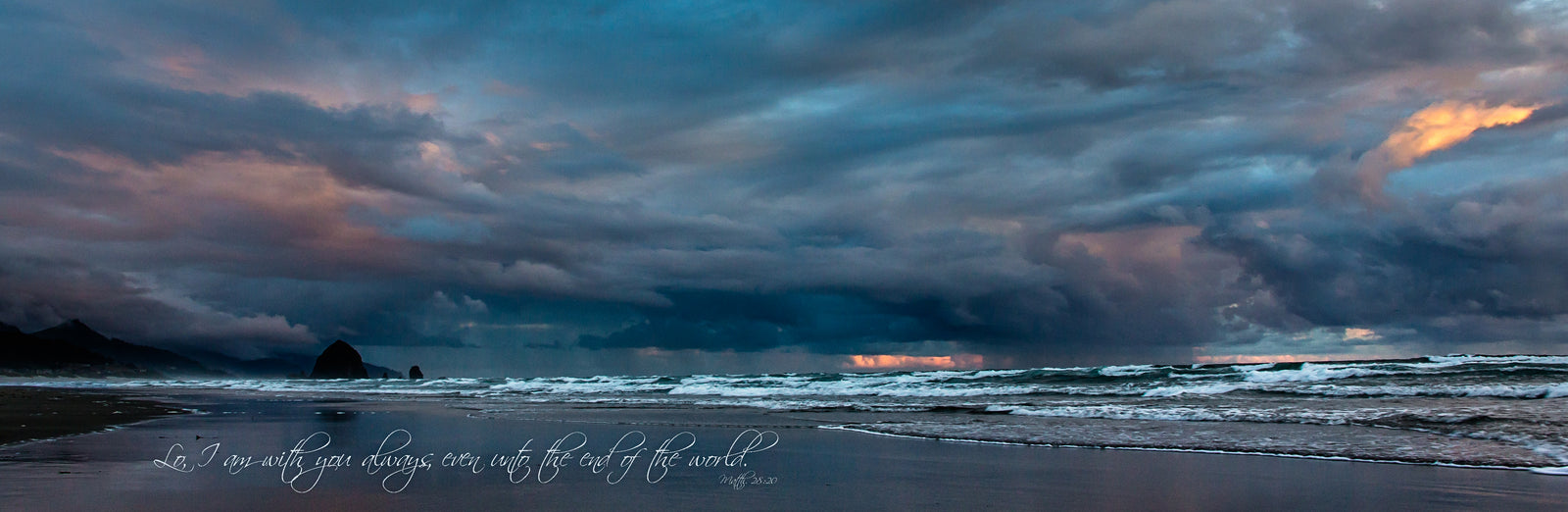 Storm over the beach at Haystack Rock during sunrise with scripture verse