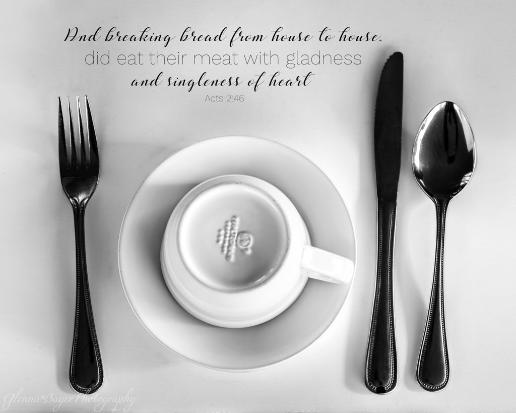 top view of cup and saucer with silverware