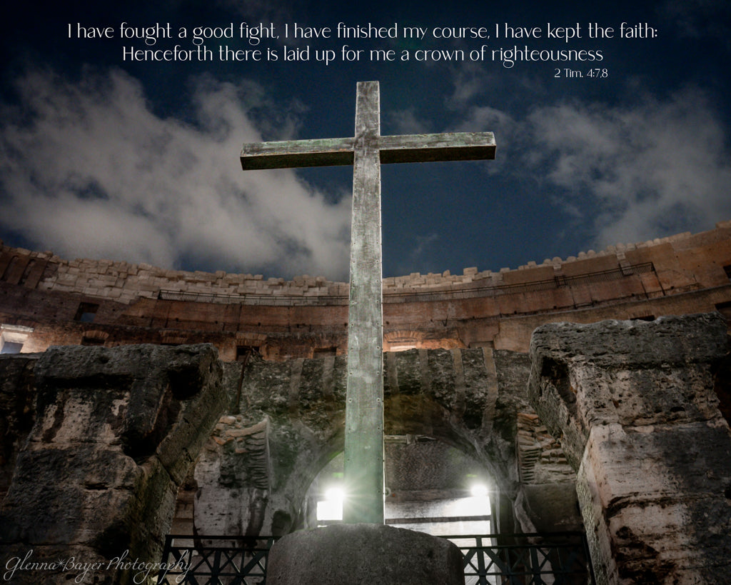 cross standing heigh in the colosseum at night