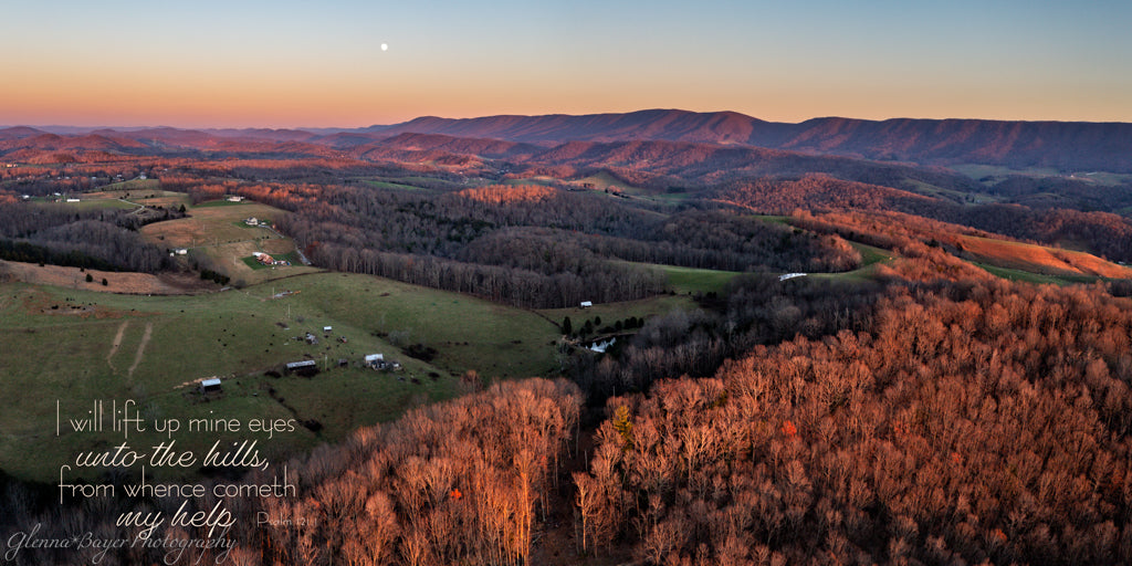 sun setting over west virginia hills