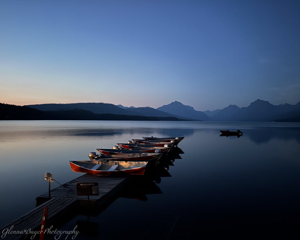 boats on dock at lake