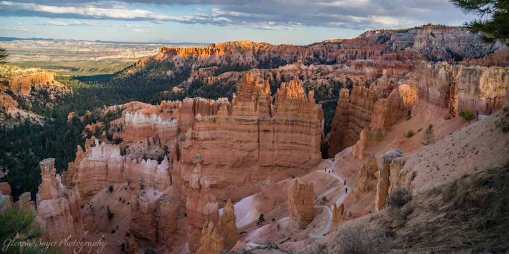 Scenic view of Bryce Canyon with hoodoos and a valley below.