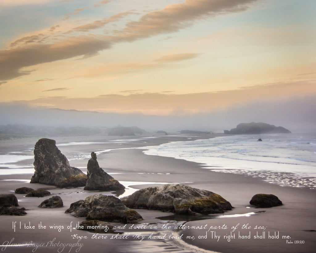 A blue, yellow sunrise at Bandon Beach in Oregon with scripture verse.