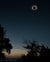 A totality composite of the sun and foreground during a solar eclipse