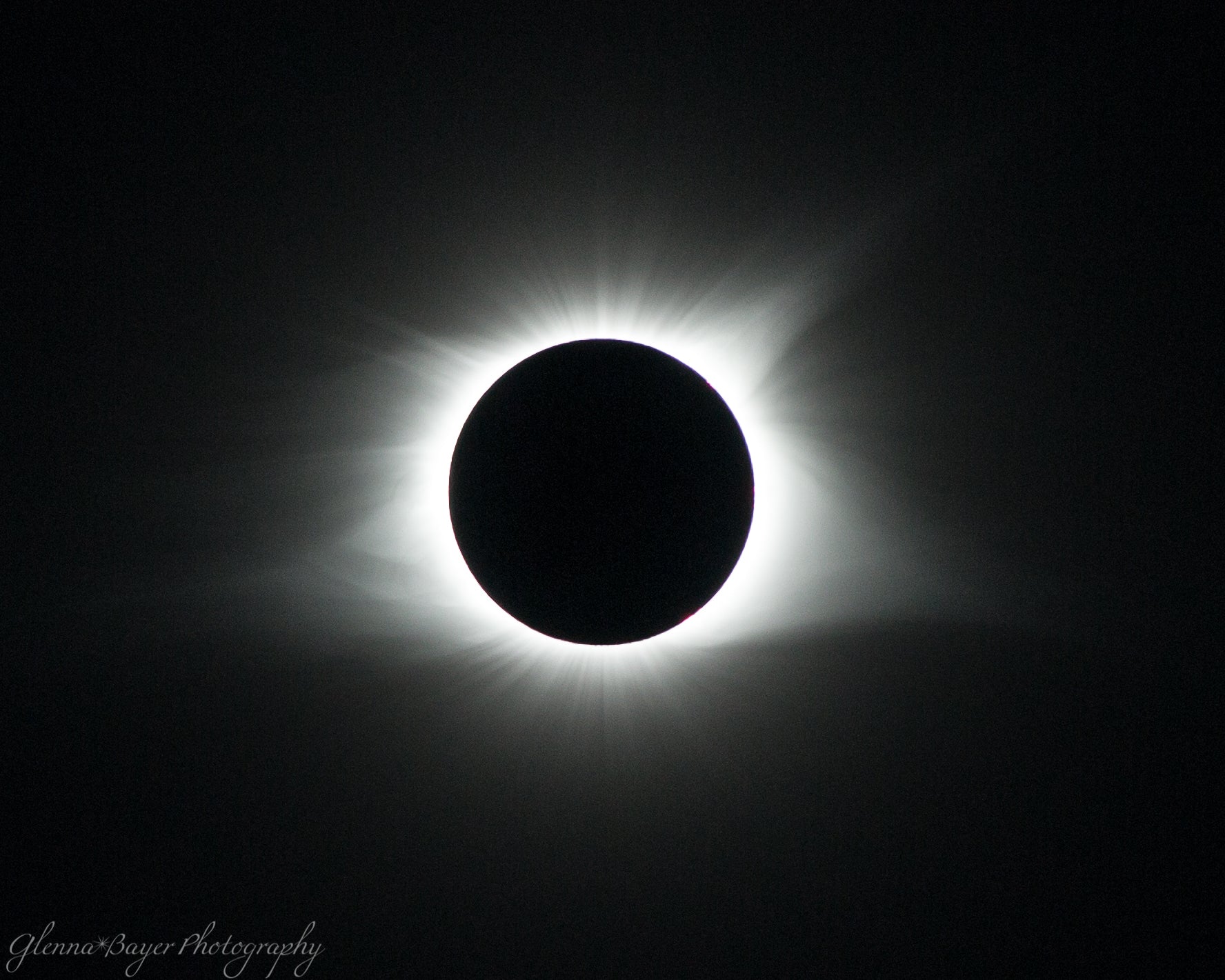 The totality coronal mass of a solar eclipse