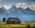 Log cabin and mountains in the Teton National Park