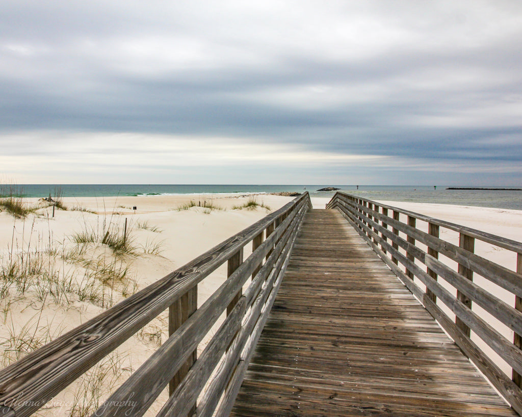 Wooden boardwalk on beach in Pensacola, Florida