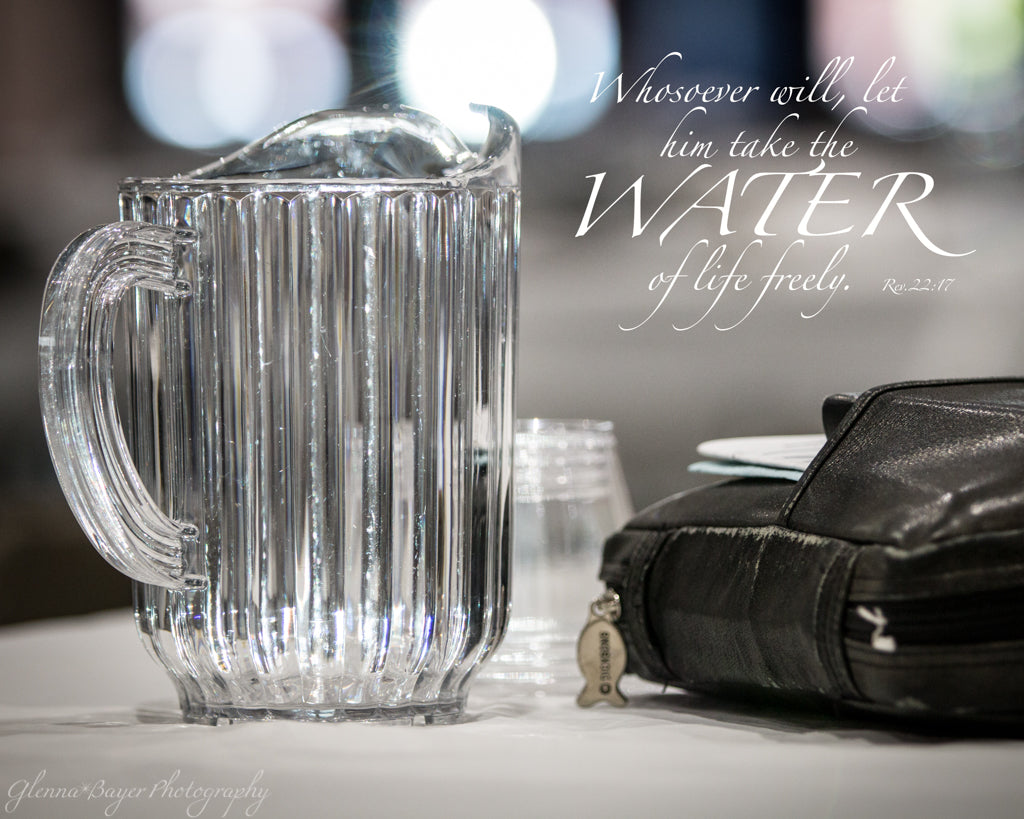 Old German Baptist Brethren Church New Conference's Communion table with Bible and water pitcher at Annual Conference with scripture verse