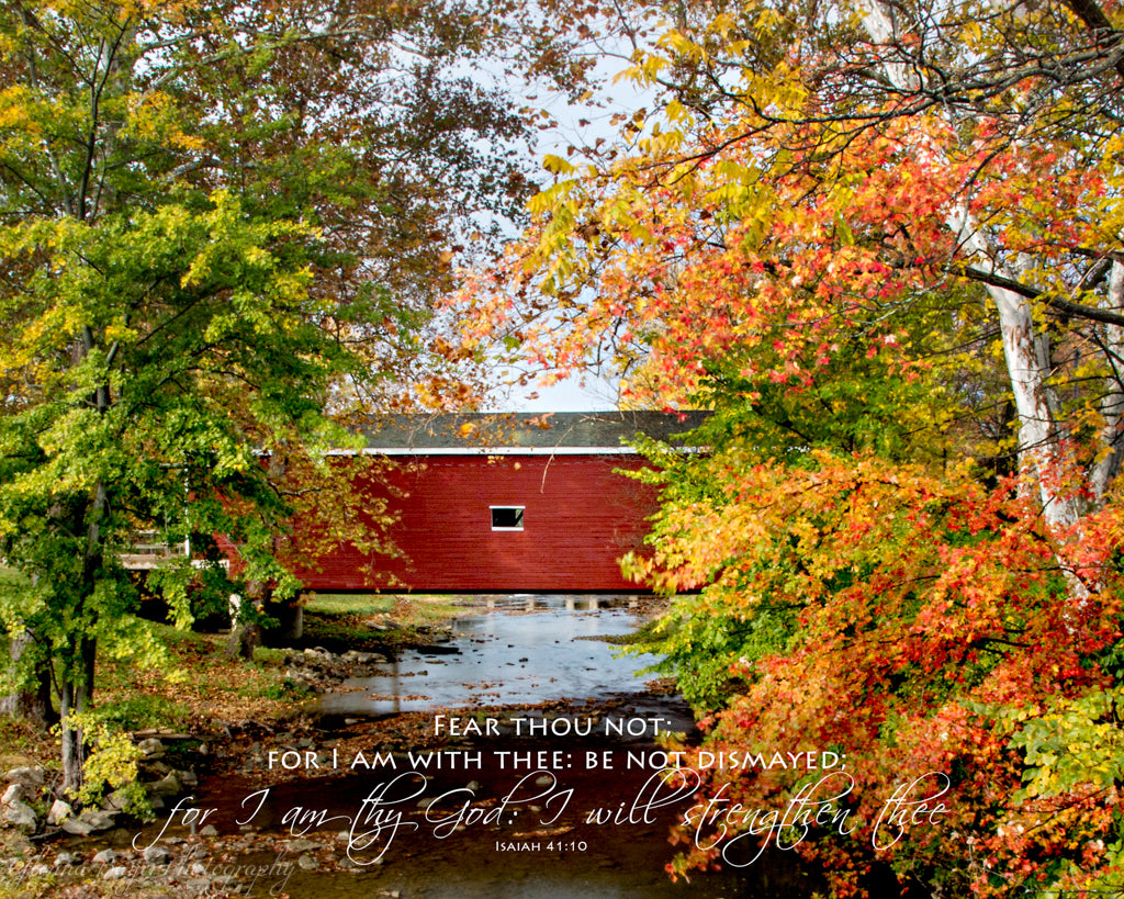 Red covered bridge with Autumn tree in Eaton, Ohio with scripture verse