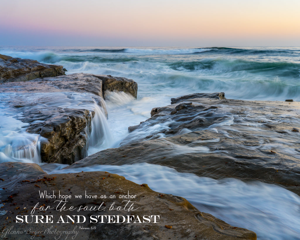 Blue waves rushing over rocks in San Diego, California with scripture verse
