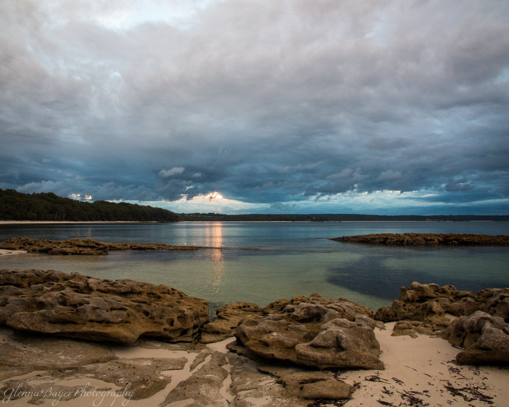 Sunset over the bay with a rocky beach in Scottish Rocks, Australia