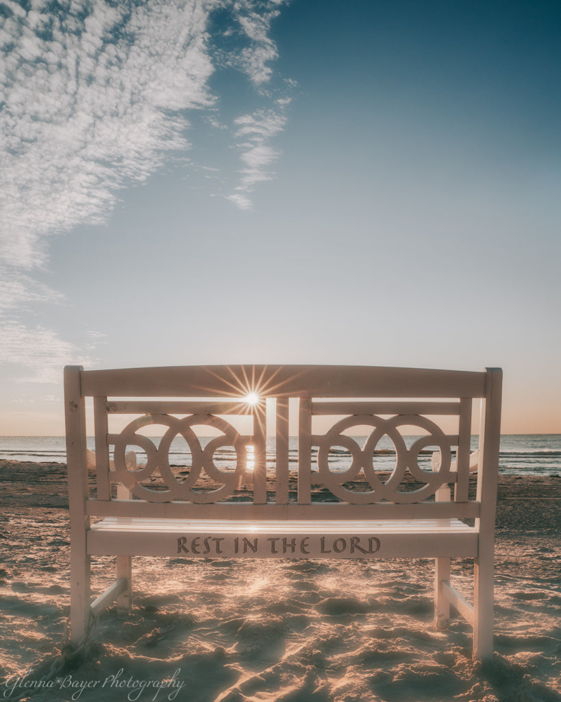 White bench on beach