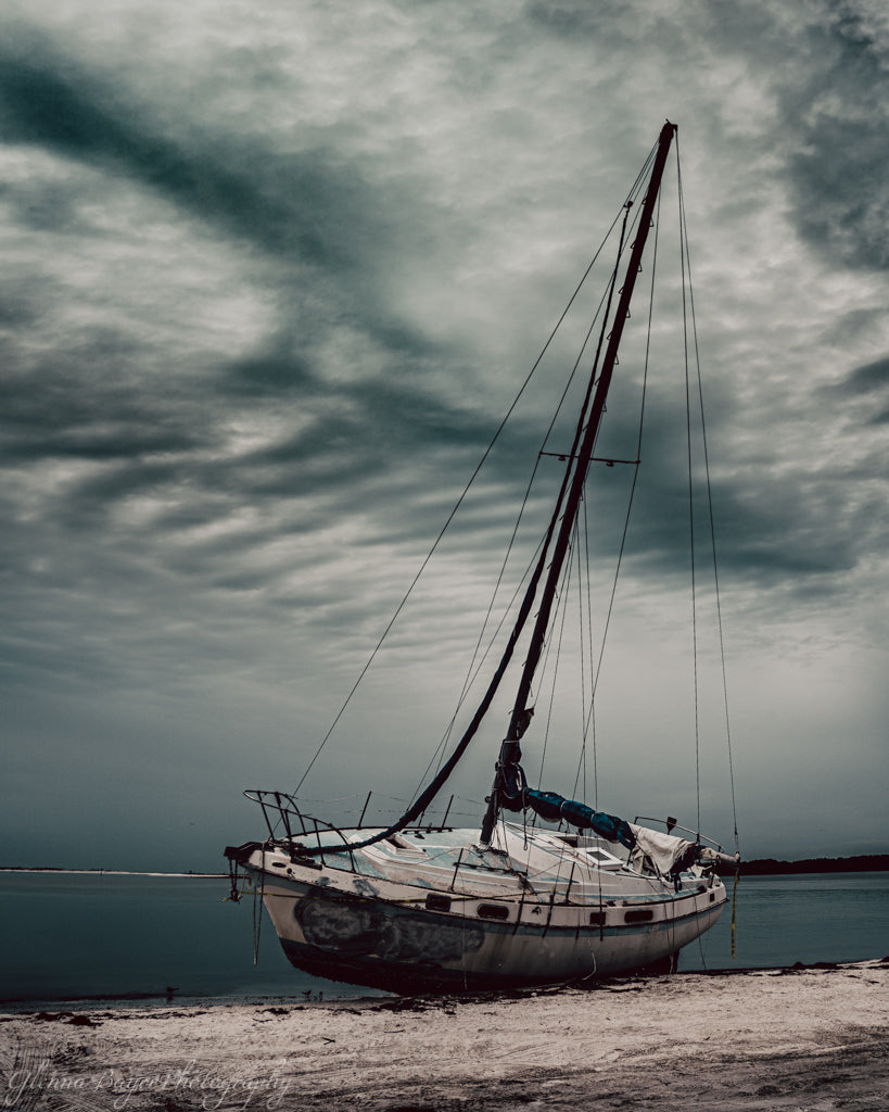 Old sailboat on beach