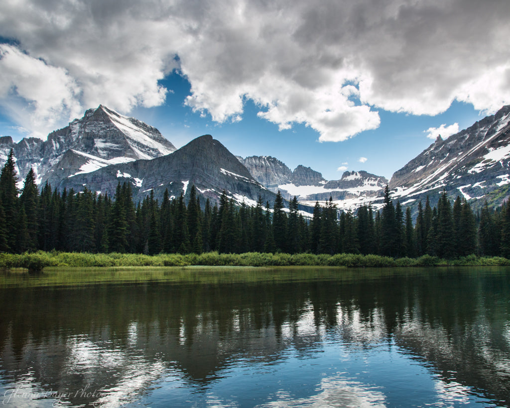 Lake Josephine in summer with snowy mountains in Glacier National Park 