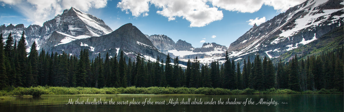 Snowy mountains in summer time at Glacier National Park with scripture verse