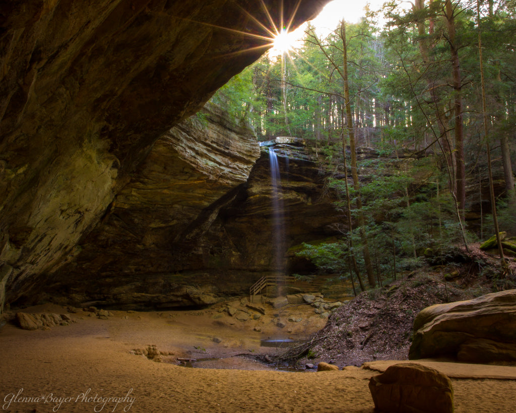 Ash Cave Sunrise with sunburst and waterfall in Hocking Hills, Ohio