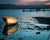 Boat and reflection on Lake Illawara in Australia at sunset