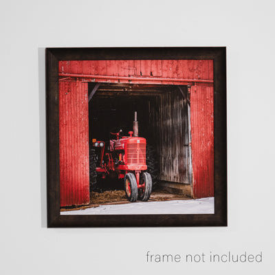 framed print of Red Tractor in Red Barn with snow