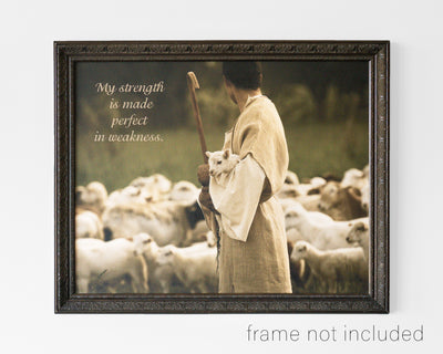 framed print of Shepherd with staff holding little lamb with flock of sheep with scripture verse