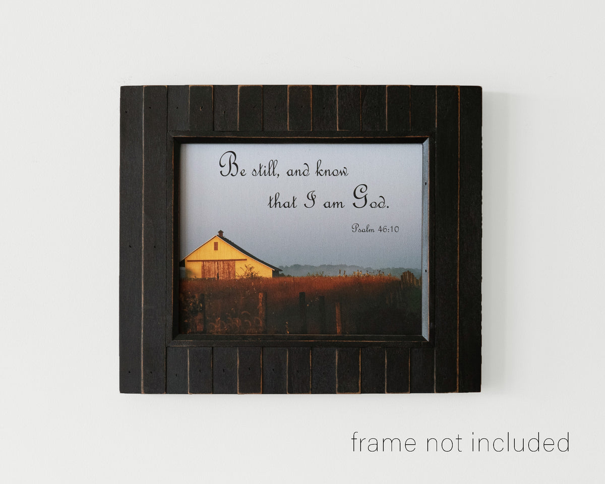 framed print of Old sunlit barn in field with scripture verse