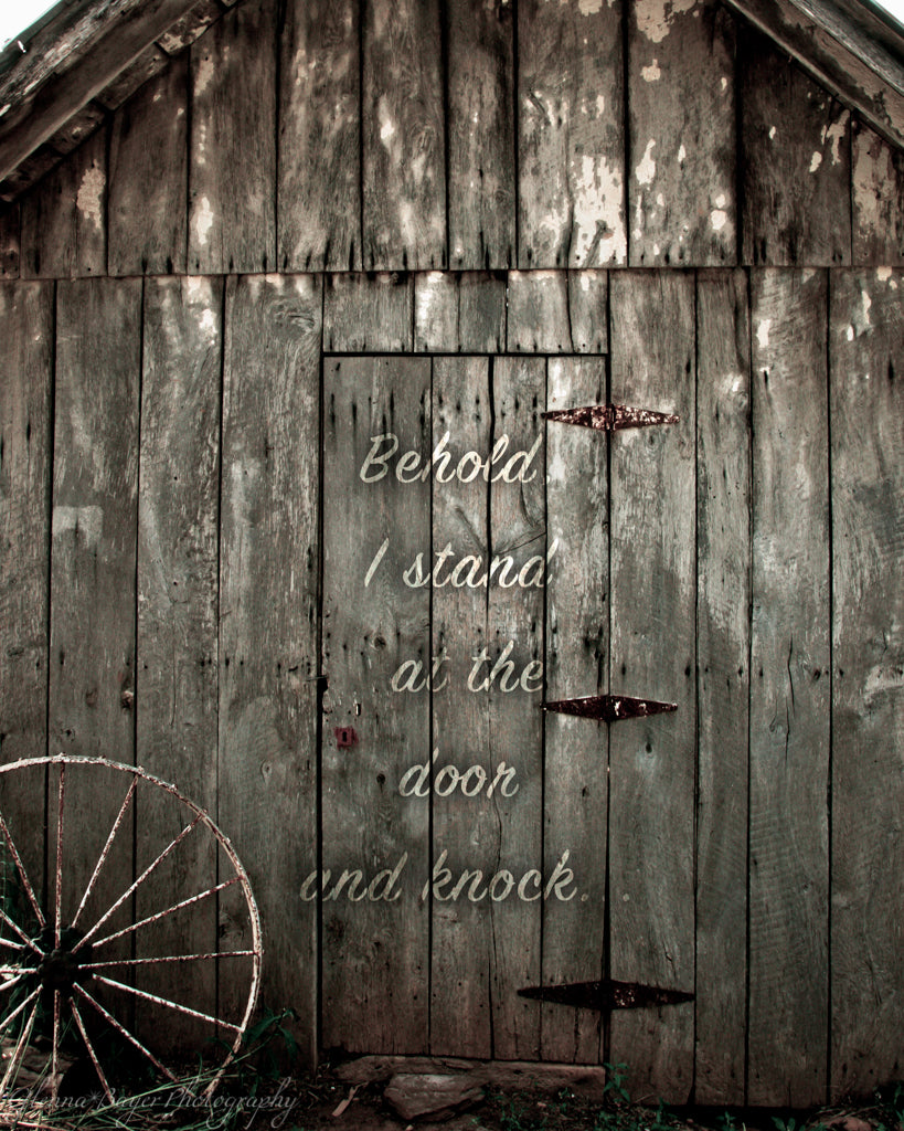 Old smokehouse door and wagon wheel with scripture verse