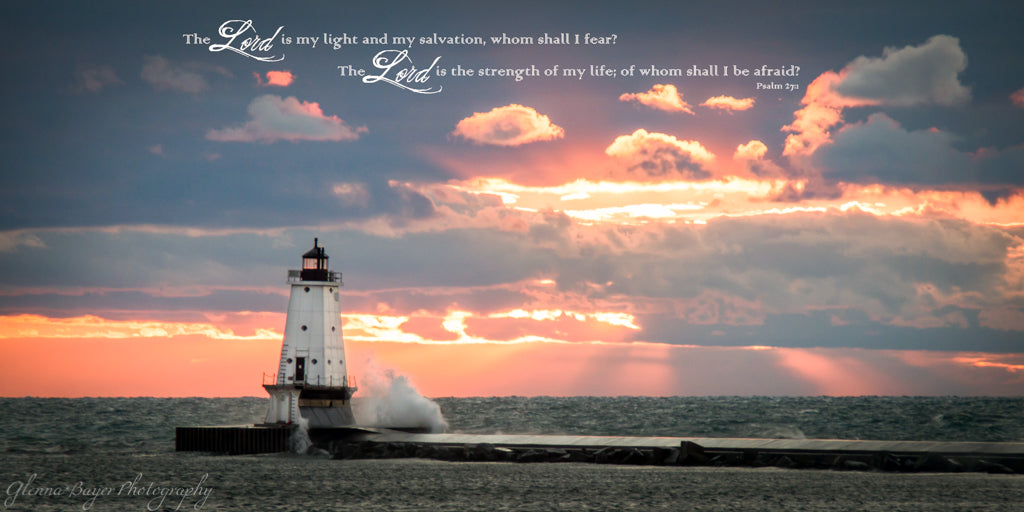 Ludington Lighthouse on Lake Michigan during sunset with scripture verse