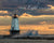 Wave crashing into Ludington Lighthouse on Lake Michigan during orange sunset with scripture verse