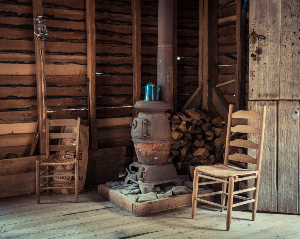 Potbelly stove and wooden chairs in the Mingus Mill in North Carolina