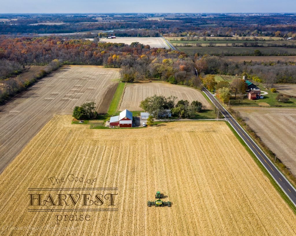 John Deer Tractor planting in harvested field with song verse