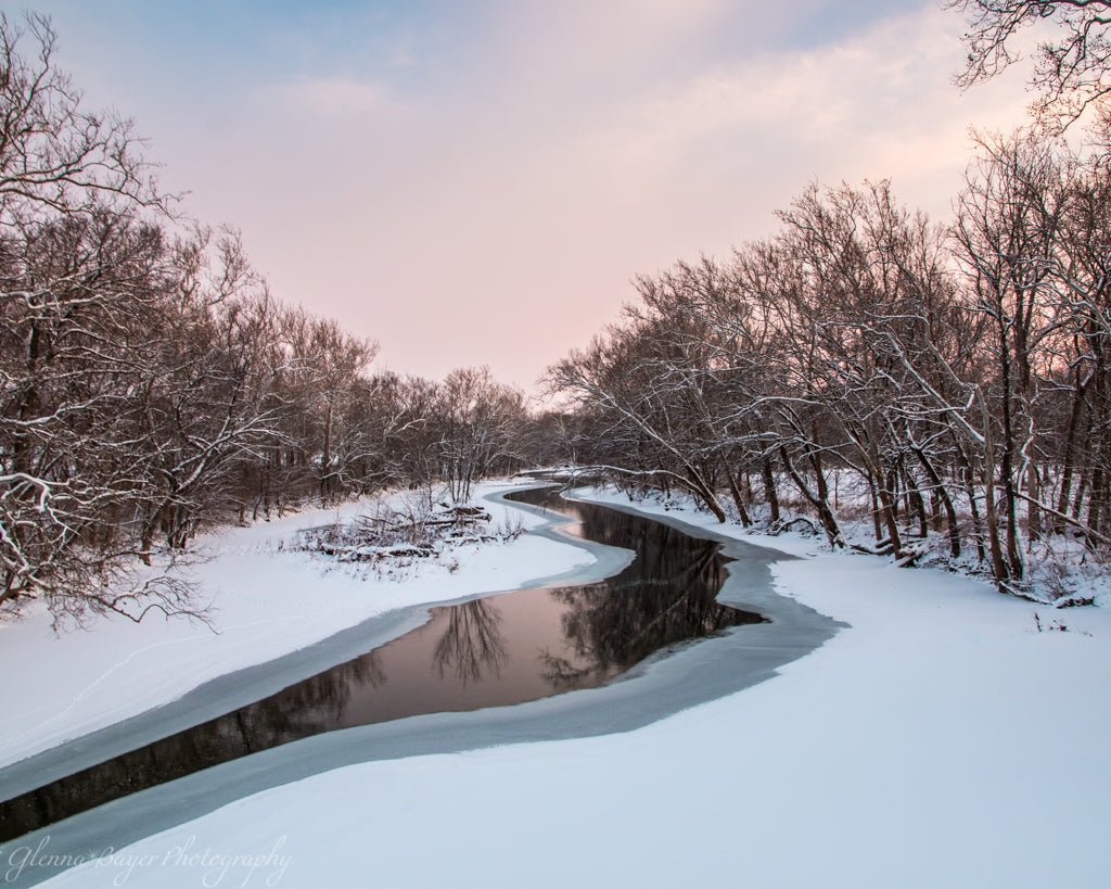 Pink sunrise and frozen Stillwater River in Ohio 