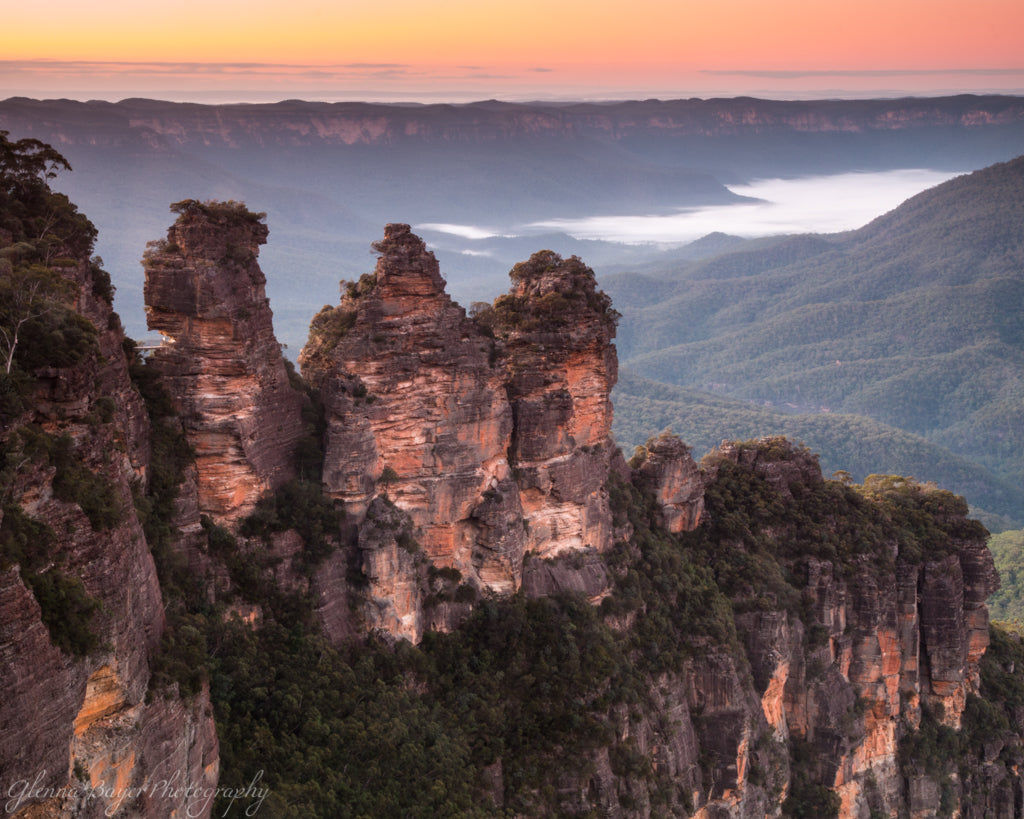 Orange sunrise over the Three Sisters, in the Blue Mountains of Australia