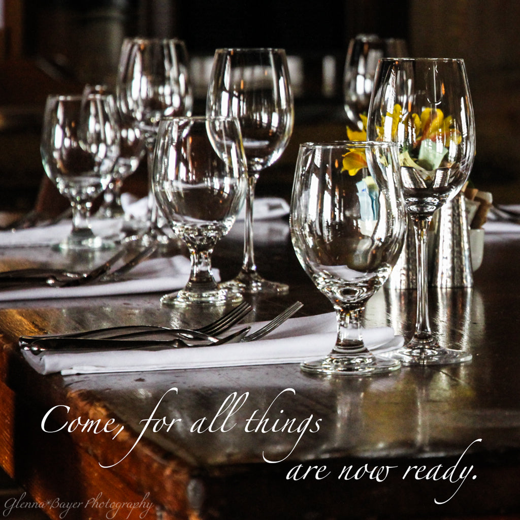 Wood table set with glass dishes at the Mount Hood Lodge in Oregon with scripture verse