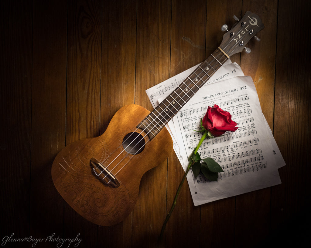 Ukelele, Music Sheet, and Rose Still Life